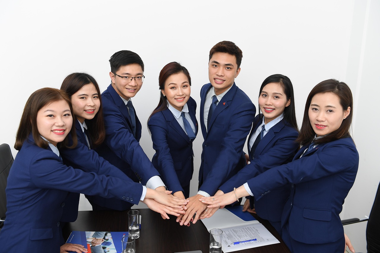 Team, business, asians — Discover the Top 10 Wealthiest Nations in the World Today
