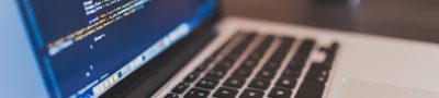 Coding, programming, working — Max Herve George Supports Innovation in Cross-Sector Real Estate