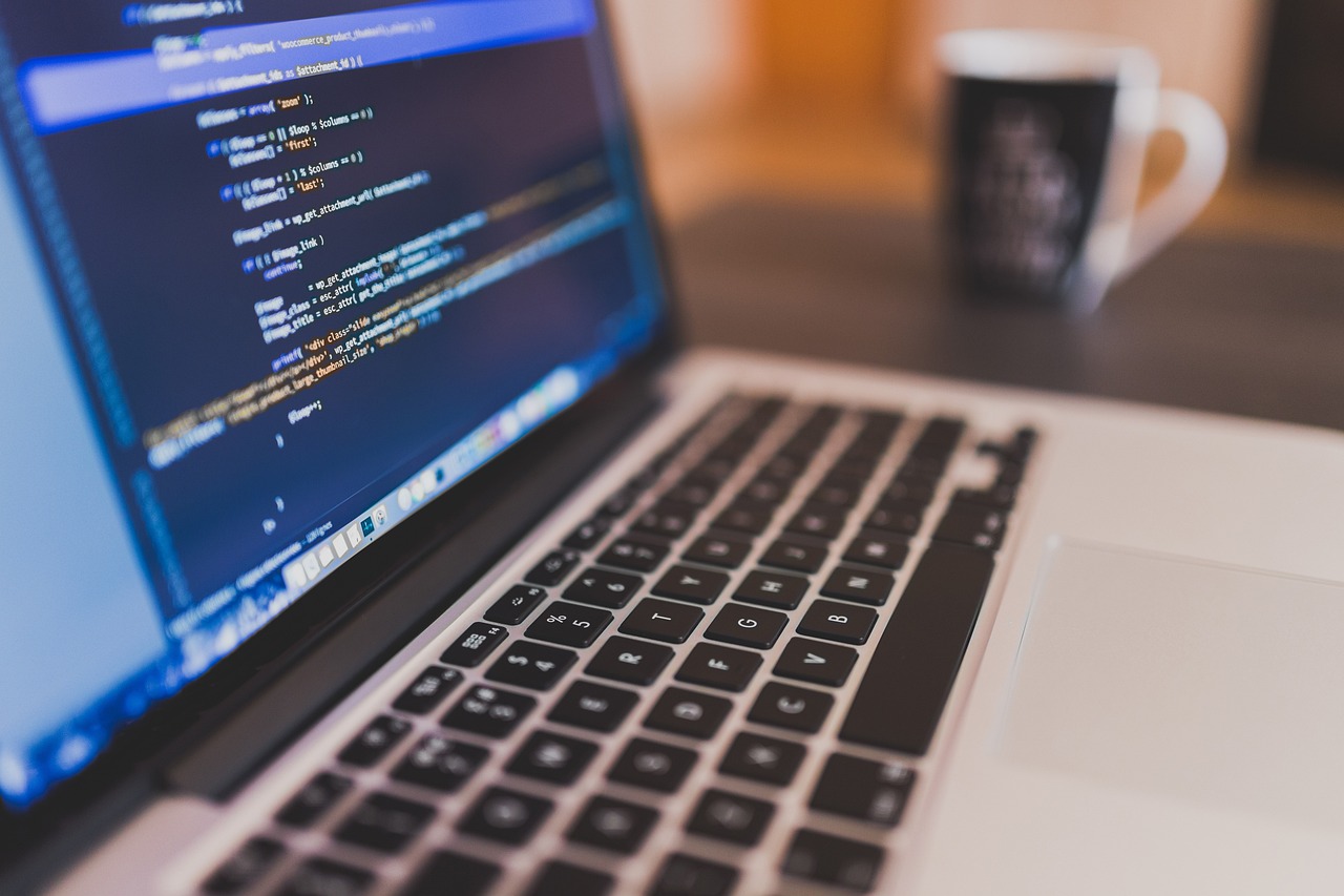 Coding, programming, working — Max Herve George Supports Innovation in Cross-Sector Real Estate