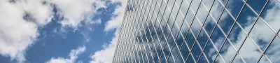Building, reflection, clouds — The Ultimate Guide to Commercial Tent Sales: Tips and Techniques