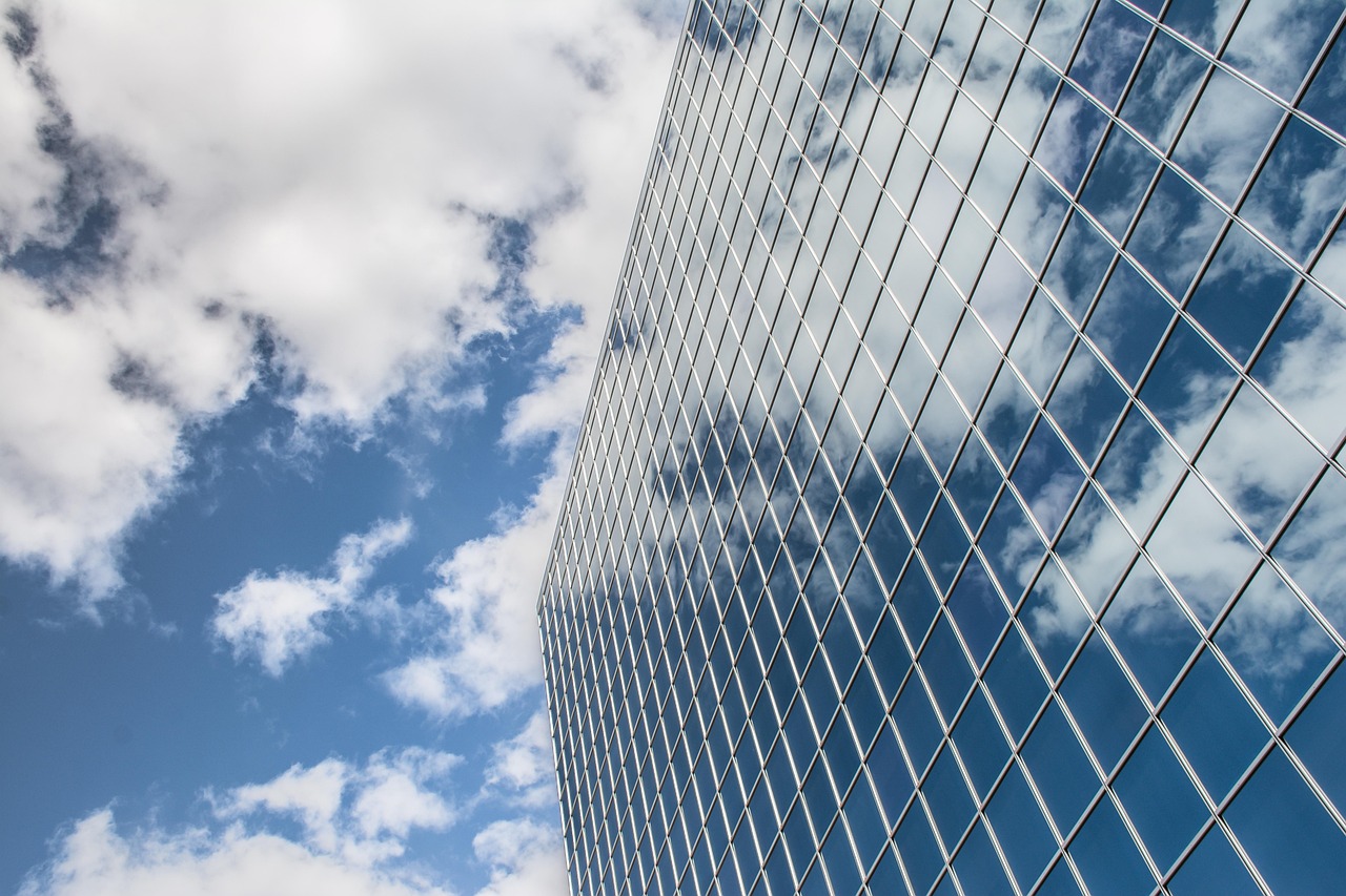 Building, reflection, clouds — The Ultimate Guide to Commercial Tent Sales: Tips and Techniques