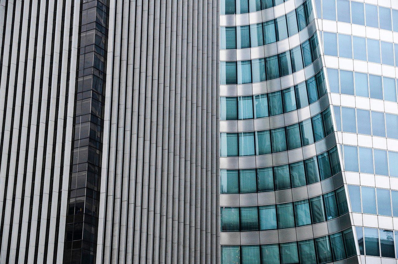 Buildings, glass, architecture — Tune Into Opportunities: Navigating the Job Market as a Karaoke Assistant